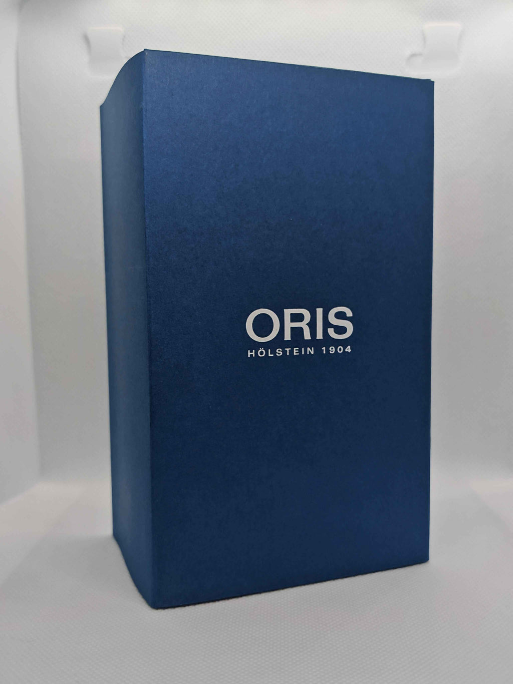 Scatola blu Oris con scritta ORIS HÖLSTEIN 1904