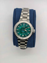 Orologio sub in acciaio con quadrante verde e bracciale a maglie