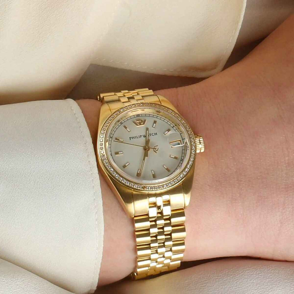 Orologio da donna con bracciale in acciaio dorato, quadrante argento e lunetta diamantata