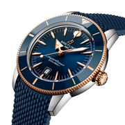 Orologio subacqueo Breitling con quadrante blu, indici oro rosa e cinturino blu