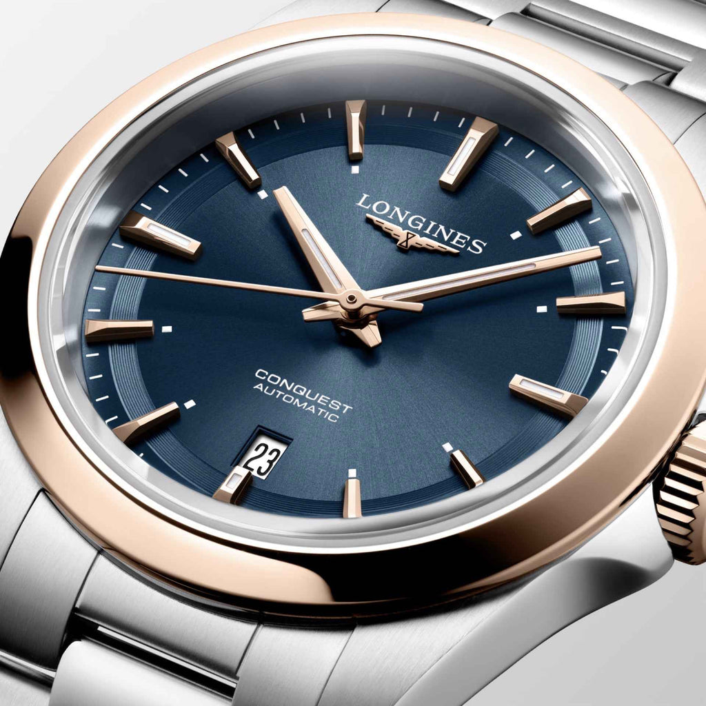 Orologio Longines Conquest con quadrante blu, indici oro rosa e cinturino in acciaio