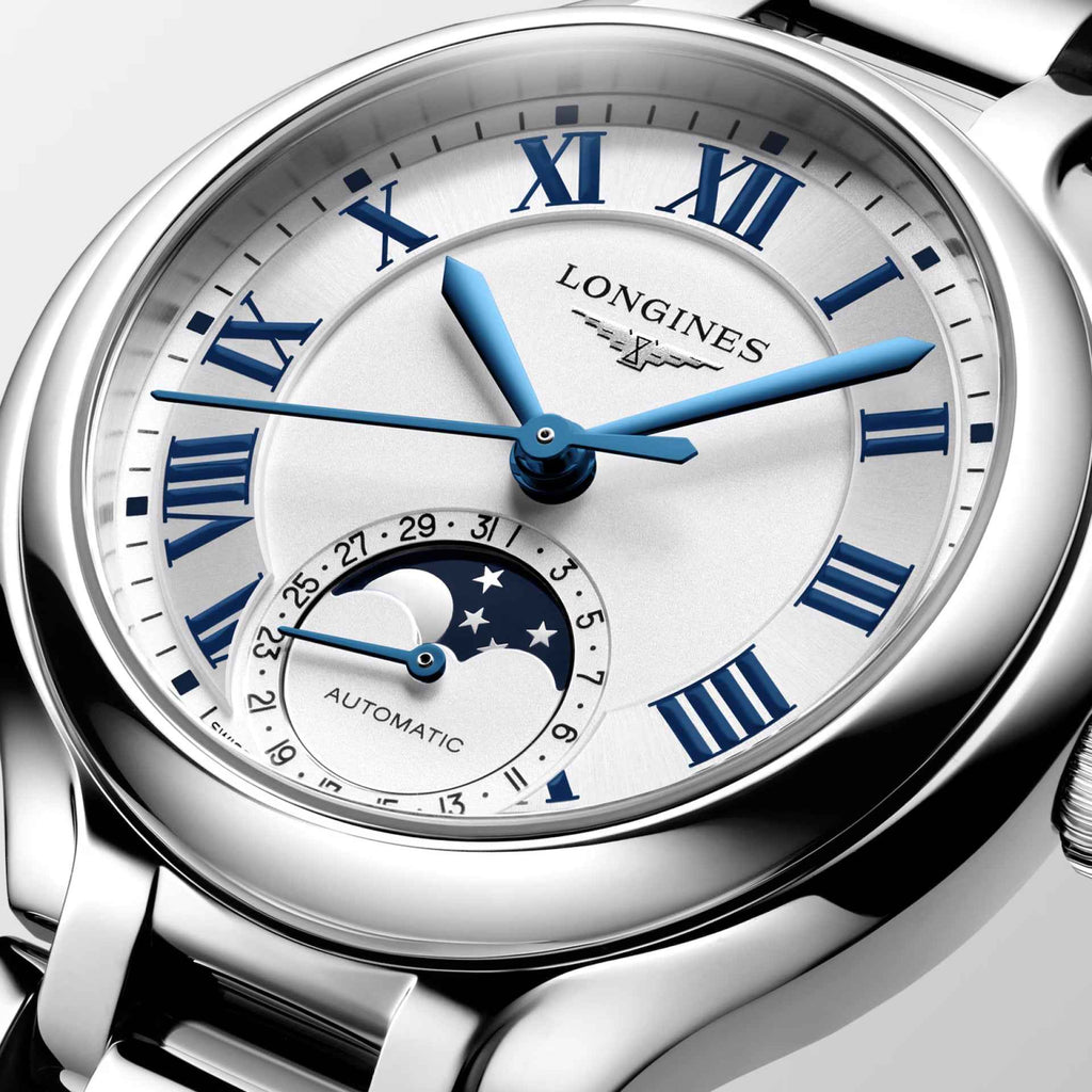 Longines orologio con quadrante bianco, indici romani blu e lancette azzurre