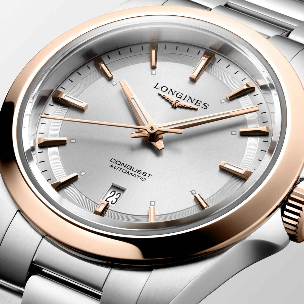 Quadrante dell’orologio Conquest con indici dorati, lancette oro rosa e datario