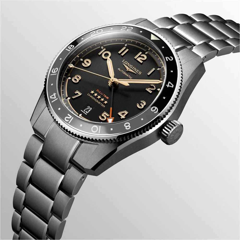 Orologio Longines con ghiera zigrinata e corona, quadrante nero, cinturino maglia