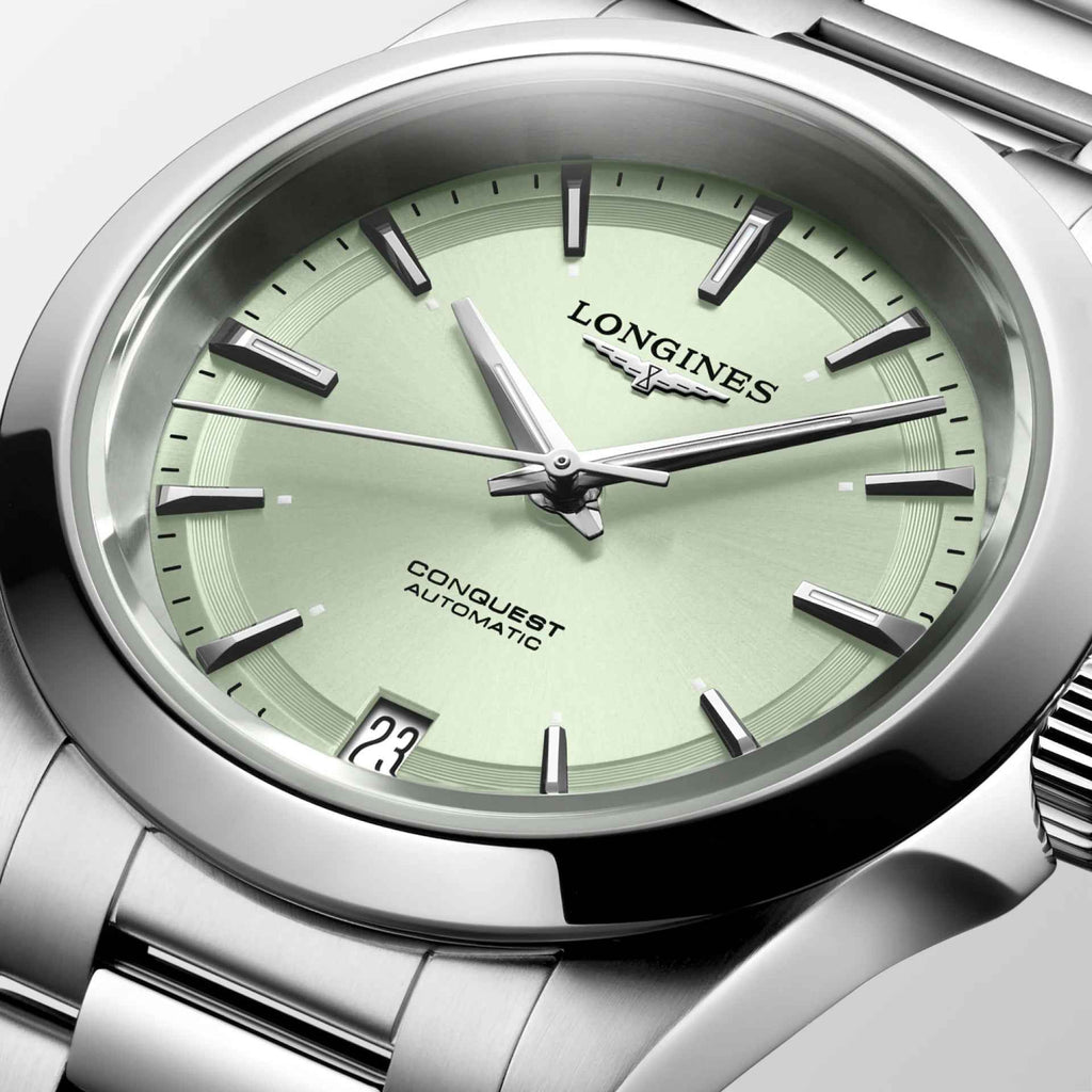 Orologio automatico: quadrante verde con indici e lancette, cassa in acciaio