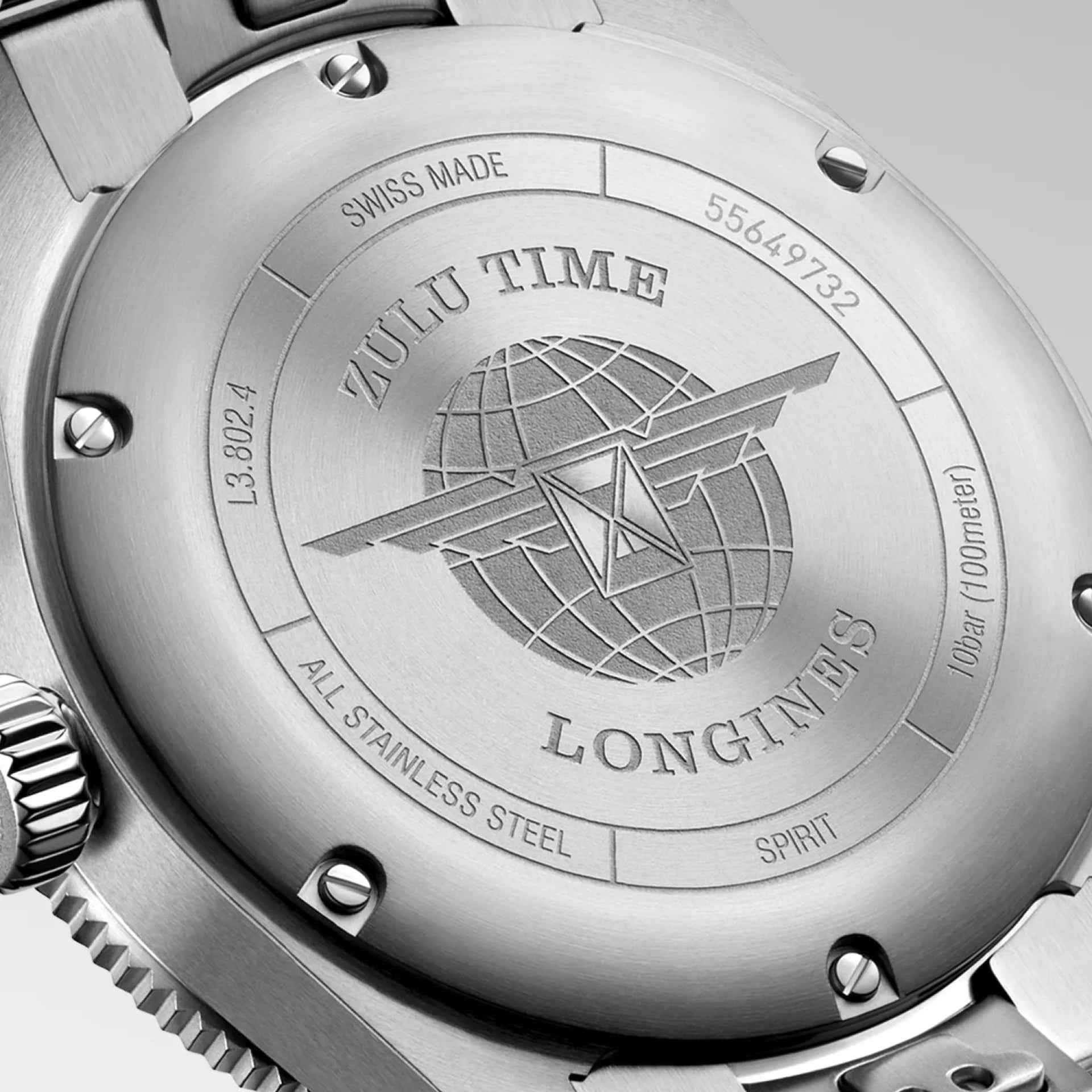 Fondello in acciaio con incisione «ZULU TIME», motivo mappamondo e scritta SWISS MADE
