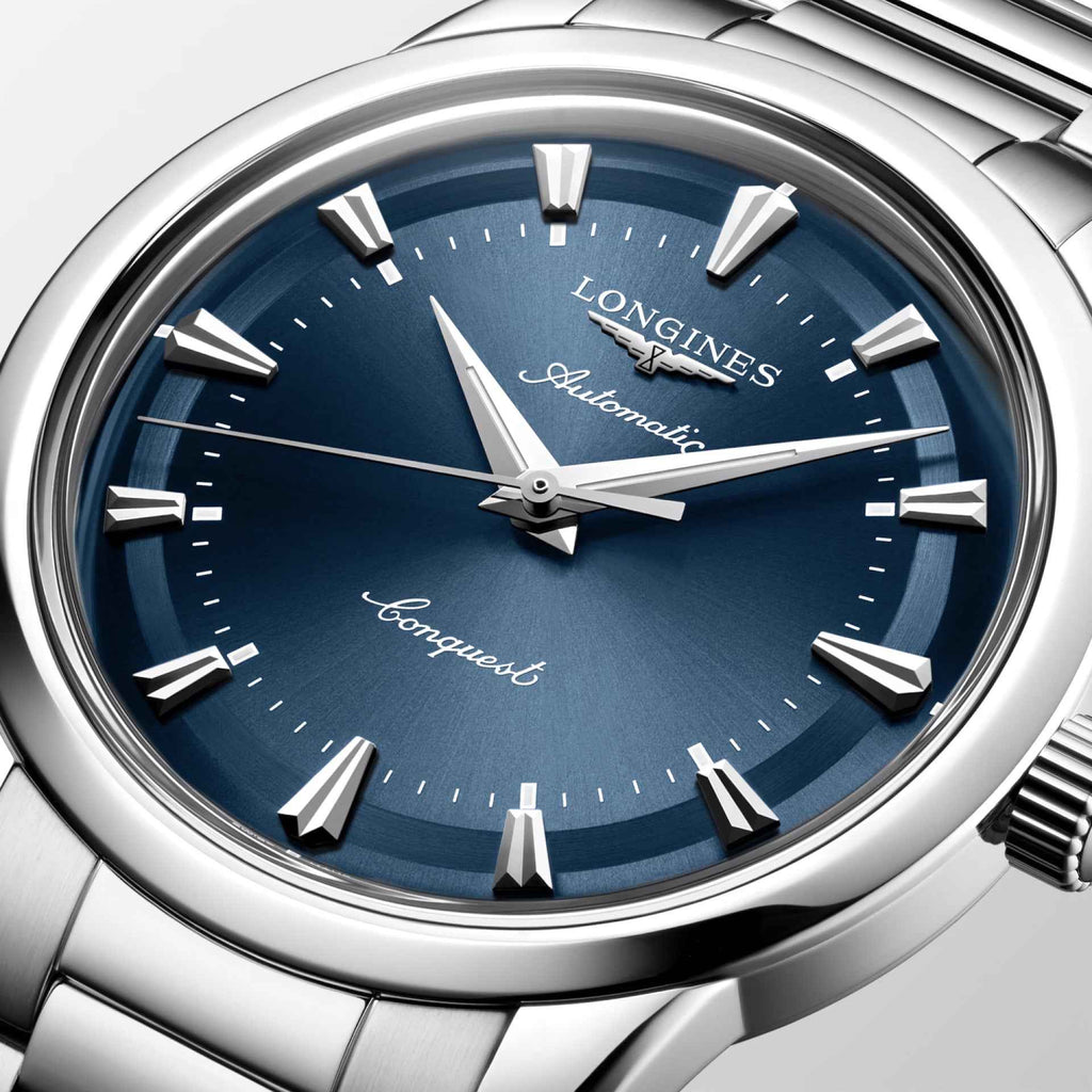 Orologio Longines Heritage 40 mm con quadrante blu, lancette e indici in metallo.
