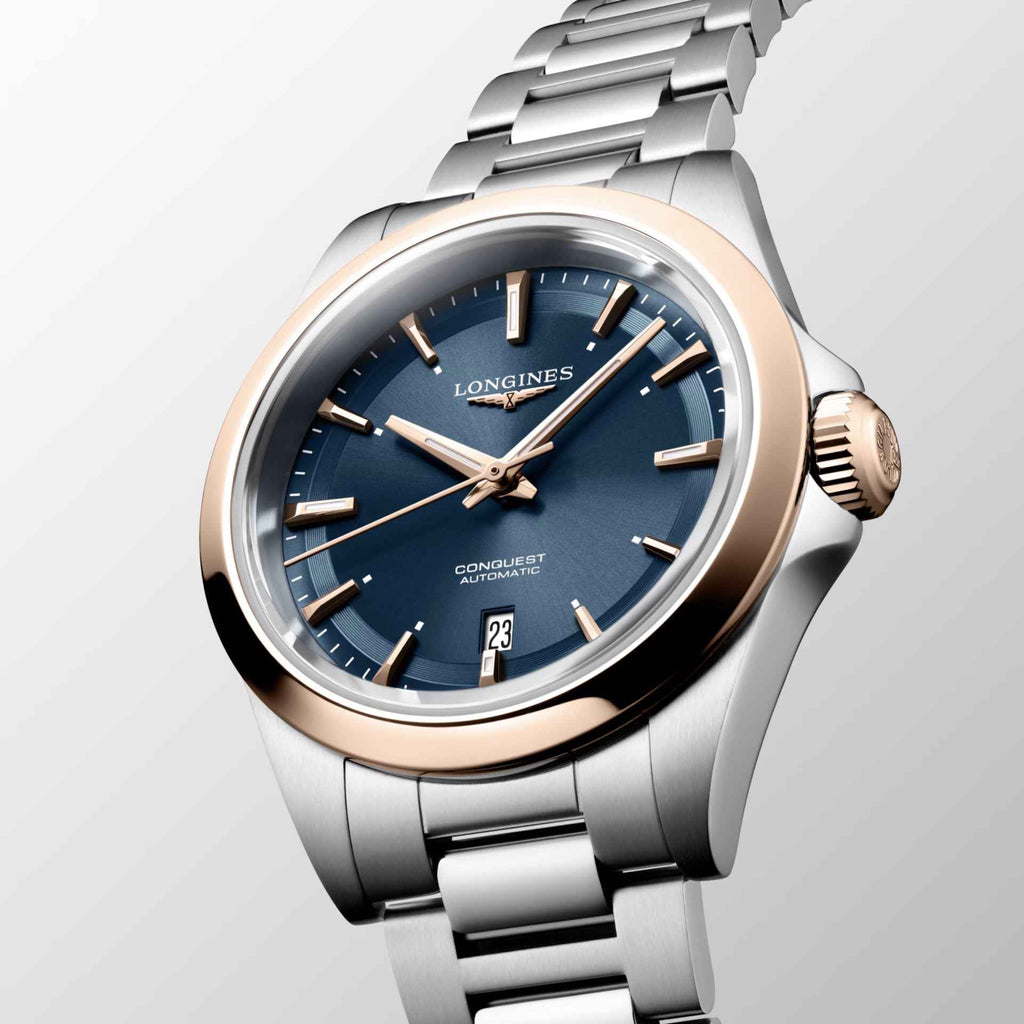 Orologio Longines Conquest 30mm automatico acciaio con lunetta e dettagli PVD oro rosa