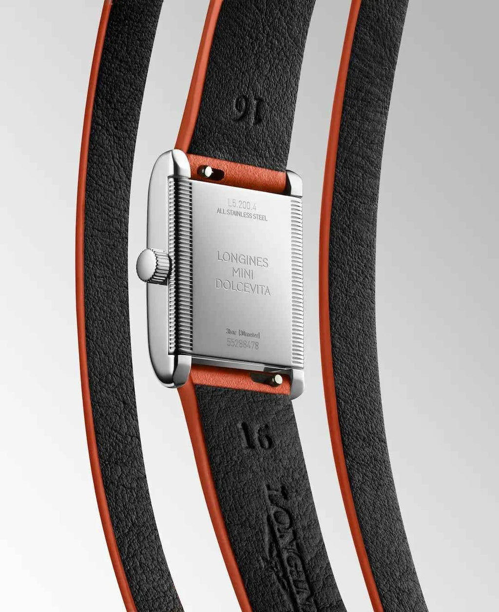 Orologio Longines Mini Dolcevita con cinturino nero e rifiniture arancioni, cassa argento.