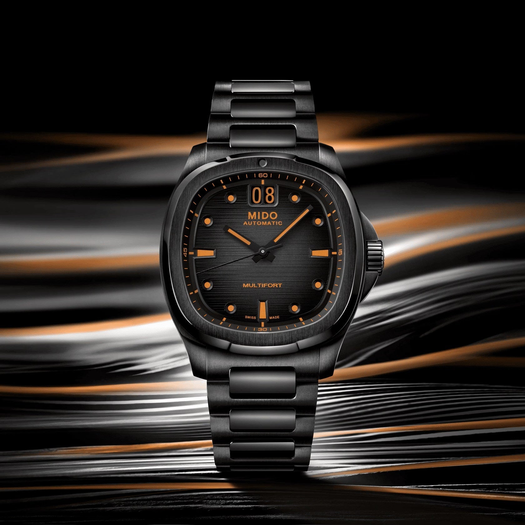 Orologio Mido automatico con cinturino maglia nero e quadrante nero con indici arancioni