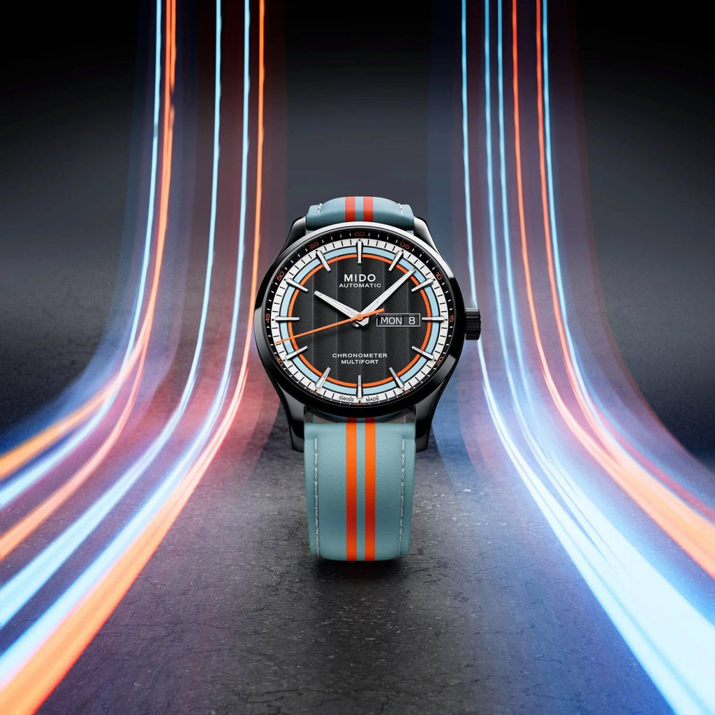 Orologio automatico Mido con cassa nera PVD e cinturino azzurro a righe arancioni