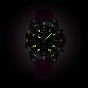 Orologio Breitling Endurance Pro 38 con display verde fosforescente, cinturino viola